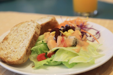 Healthy breakfast, Fresh vegetable and fruits salad with toast.