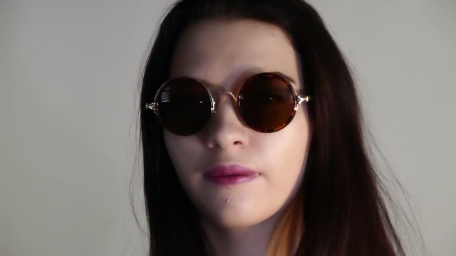 Portrait of a girl in sunglasses