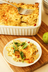 Paste farfalle pudding pumpkin puree on wooden cutting board