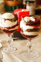 Pumpkin cream and biscuits layered in glasses on the table