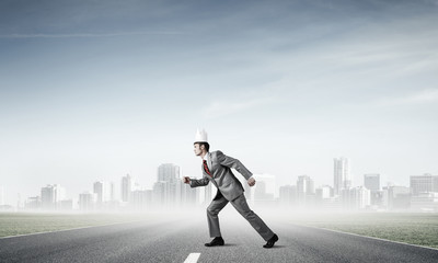 King businessman in elegant suit running and business center at 