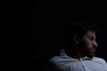 Darkness with sad man