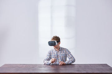Fototapeta premium Man wearing vr headset