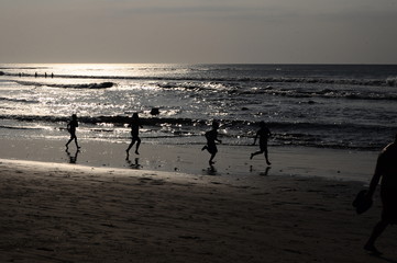 Fototapeta na wymiar Running at Beach