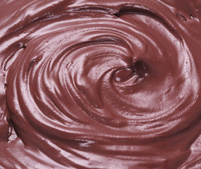 Melted chocolate or chocolate glaze.