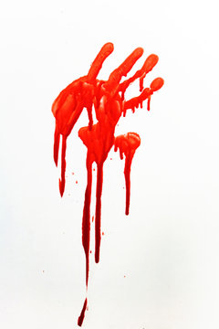 A human handprint stained with blood.