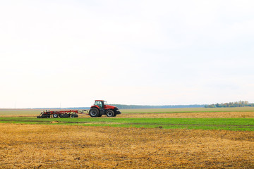 Obraz premium Combine harvester working on the harvest