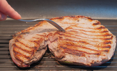 Beef steak on the grilled.