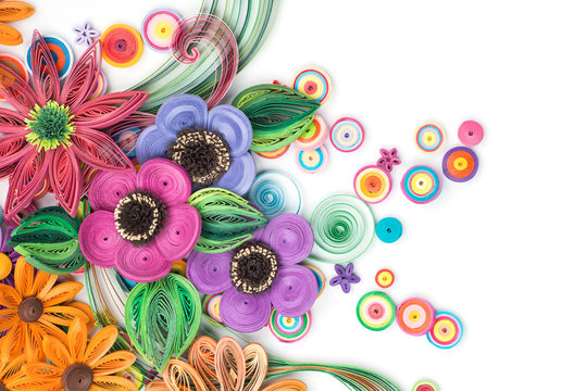 Beautiful flowers made in quilling art