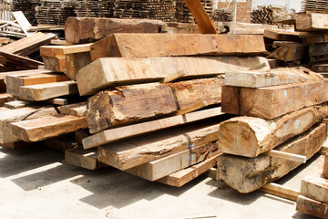 Pile of teak wood at woodyard in suburb factory, Northern Thailand