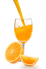 Glass of orange juice isolated on white background. © Kris Petkong
