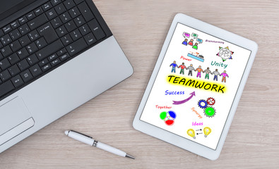Teamwork concept on a digital tablet