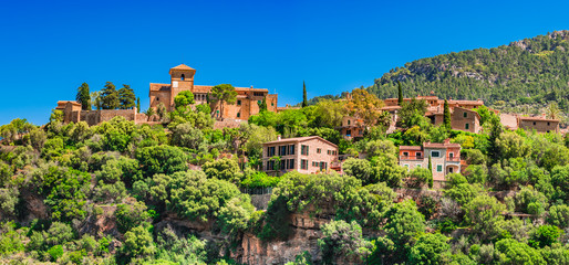 Fototapeta na wymiar Spain Majorca view of the mountain village Deia at the Serra de Tramuntana