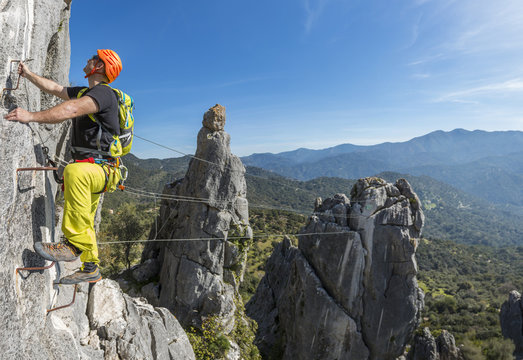 Man climbing a via ferrata