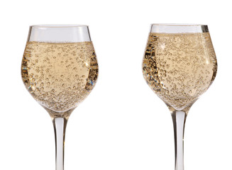 Champagne in wineglass on white background
