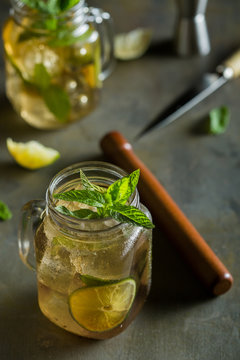 Close up of mojito served with lime and mint