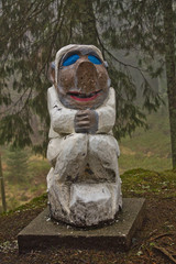 Fototapeta na wymiar wooden sculpture mythical creature guard of forest legend