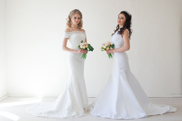 Fototapeta premium two wedding bride with bouquet wedding