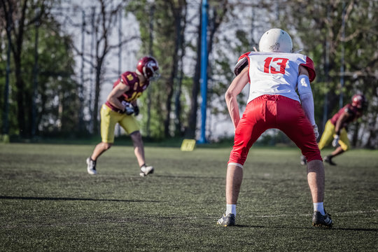 American Football Sportsman Player Standing On The Field