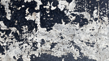 close up shot of an old black wall surface texture background in Full HD ratio