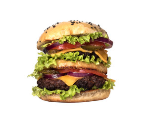 Big juicy hamburger with vegetables and beef. Isolated on white
