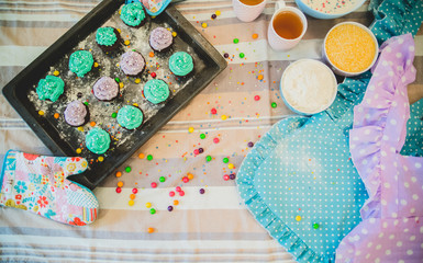 colorful cupcakes are on the tray