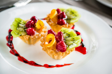 Cake dessert fruity berry cream on a plate