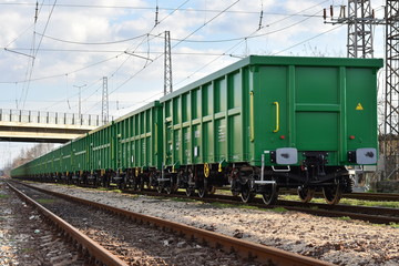 Burgas, Bulgaria - March 20, 2017 - Freight cargo train - 4axled box wagon green Type:Eanos...