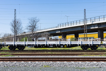 Burgas, Bulgaria - March 20, 2017 - Freight cargo train - 4axled flat wagon white Type:Rens...