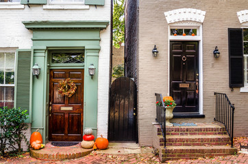 Traditional Front Doors with Halloween Decorations