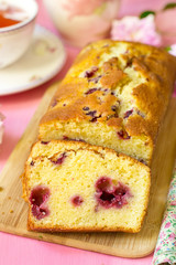 Sweet cake with fruit and berries on pink background