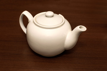 Tea kettle on a wooden table