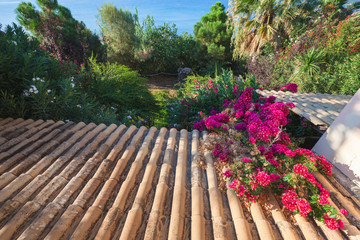 Old clay tiling roof slope goes down