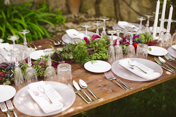 Luxury table for a wedding decorated with flowers