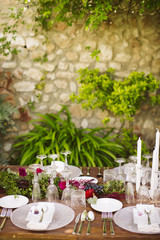 Luxury table for a wedding decorated with flowers