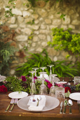 Luxury table for a wedding decorated with flowers