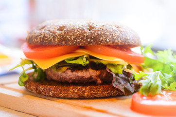 Homemade burger with beef and rye bread