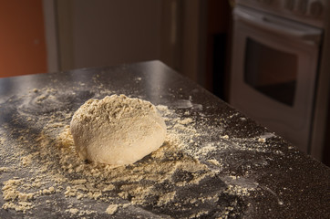 the piece of dough lying on the table