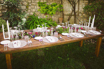 Luxury table for a wedding decorated with flowers