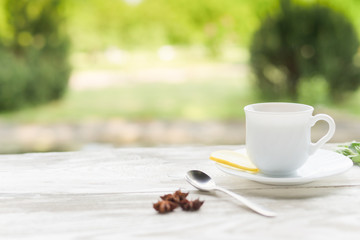 Fototapeta na wymiar Herbal tea with mint on old wooden table.
