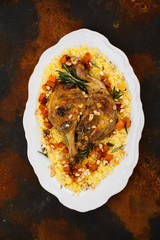 Christmas roast duck legs and couscous