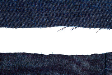 Pieces of dark blue jeans fabric