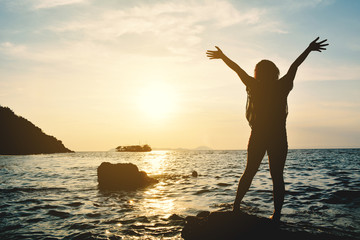 Fototapeta premium Silhouette of women relaxing on the sea concept travel in summer