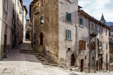 glimpse of Scanno historical downtown with sunlight reflections