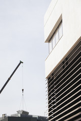 Obraz premium Installation industrial air conditioner with a crane