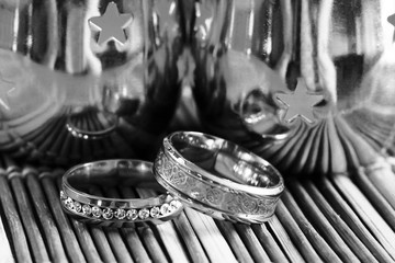 Two gold wedding rings with reflections, brilliant luxury