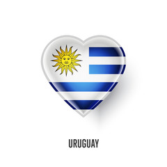 Obraz premium Patriotic heart symbol with Uruguay flag vector illustration isolated on white background. Love Uruguay design element or shiny logo, glossy button.