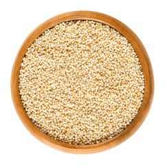 Puffed amaranth in wooden bowl. Popped grains of Amaranthus. Pseudocereal and rediscovered healthy staple food of the Aztec. Breakfast cereal. Isolated macro food photo close up from above over white.