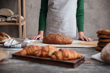 Cropped photo of young lady baker