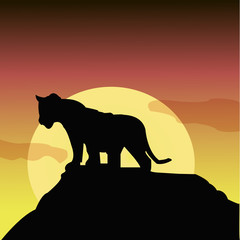 Illustration of a black silhouette of a lion on a rock. © Anna